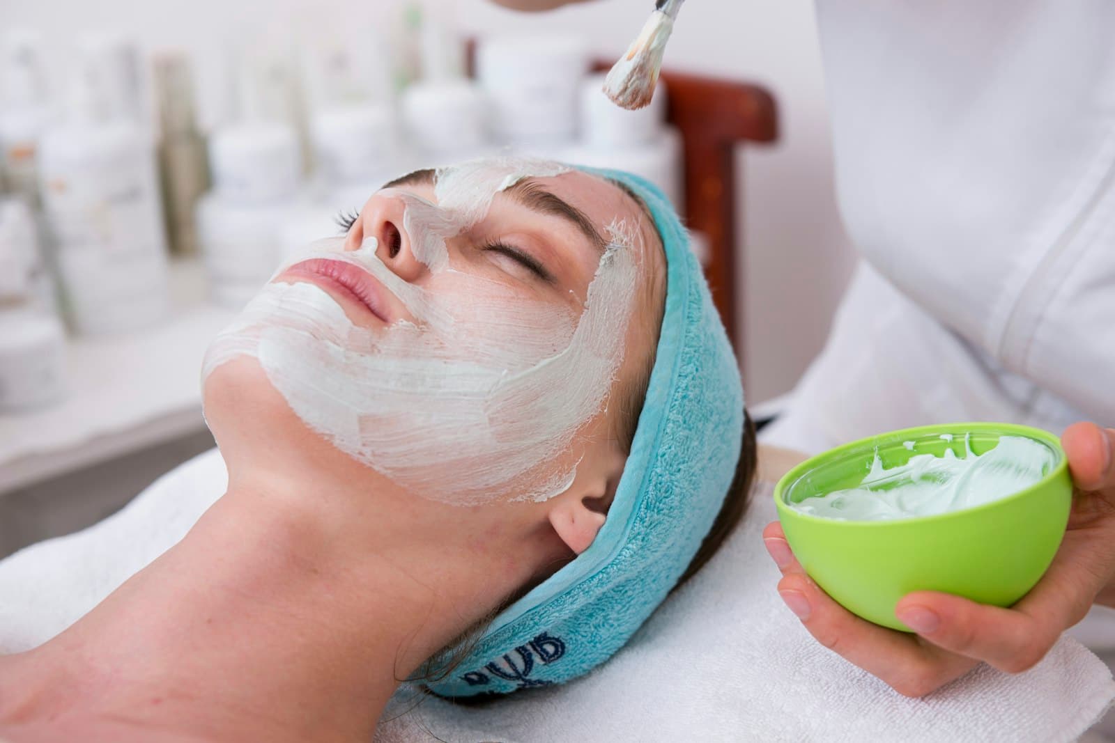 Aesthetician in a calm modern medical spa treatment room